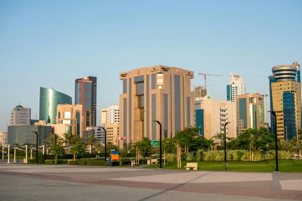 Skyline view of Bahrain's Diplomatic Area showcasing modern architecture and skyscrapers under a clear day sky.